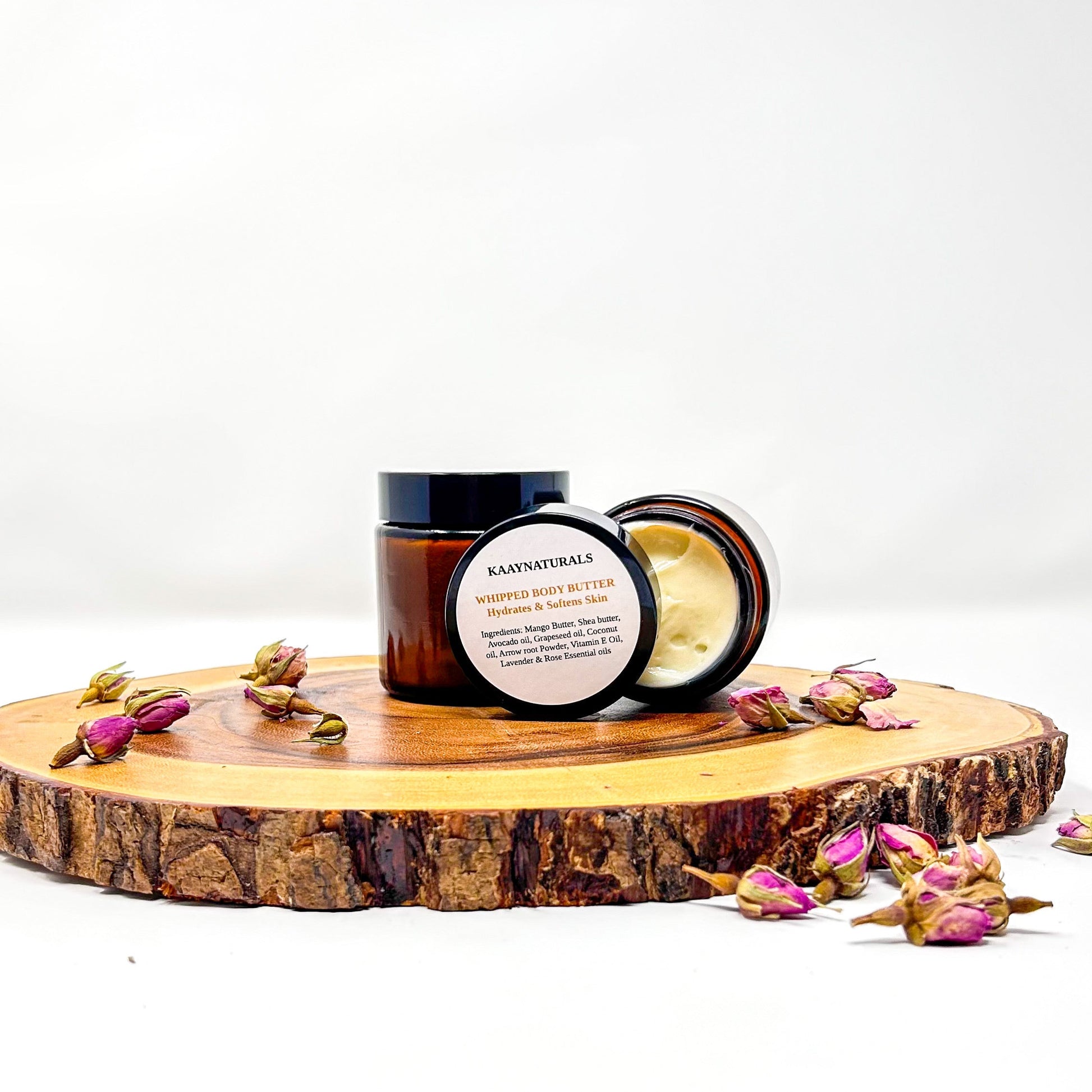 Candle on a wooden stand with a white background